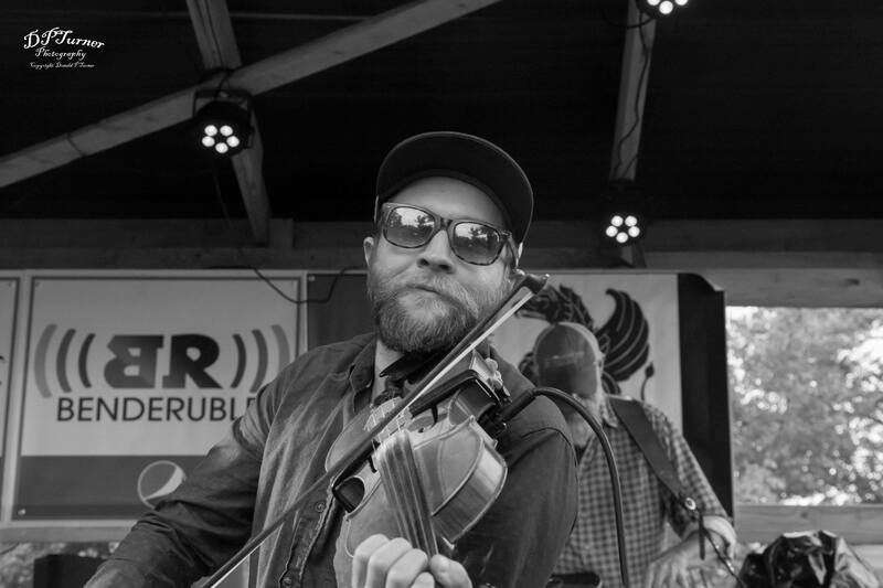 Jackson Clarendon plays the fiddle and mandolin in Laramie Wyoming band Ten Cent Stranger.