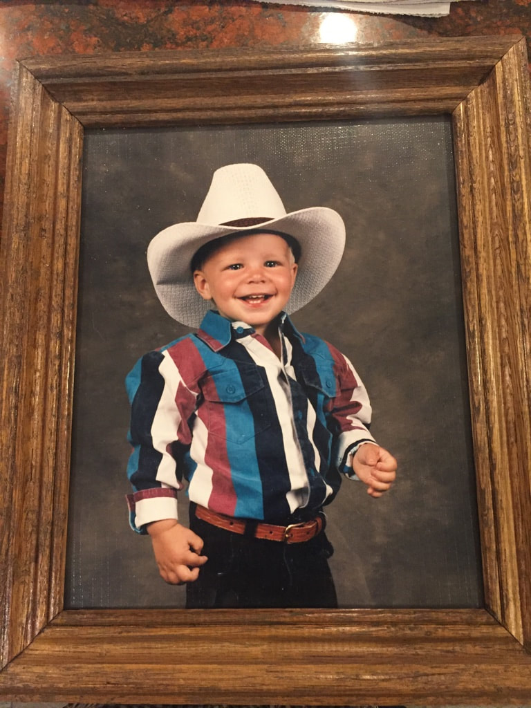 Young Shawn Hess dressed up as a cowboy.